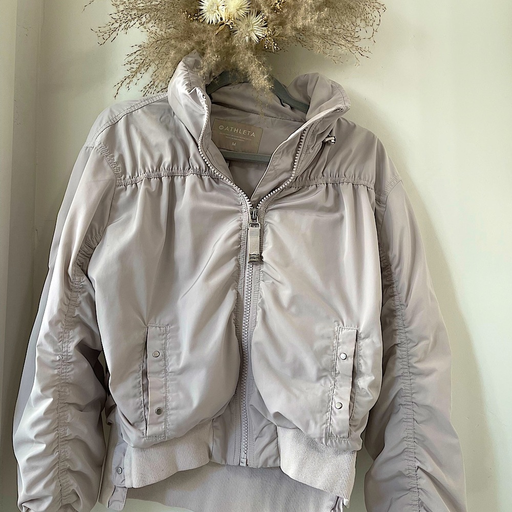 Super Light purple color. Bomber style w hood  worn but in great condition.
